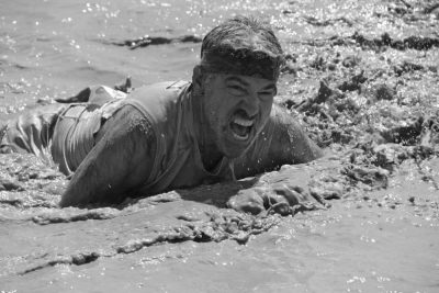 soldier struggling in mud race